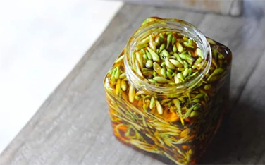 Những tác dụng bất ngờ của hoa đu đủ đực ngâm mật ong